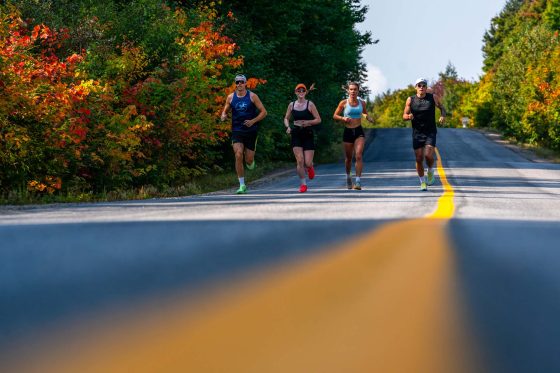 people running on a highway in Ontario