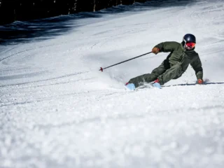 Skier at a resort on Renoun skis