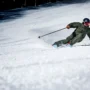 Skier at a resort on Renoun skis