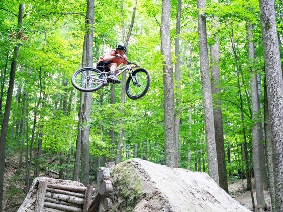 Mountain bike getting air in Ontario forest